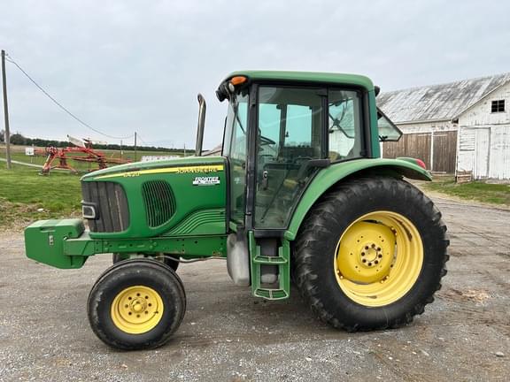 Image of John Deere 6420 equipment image 1