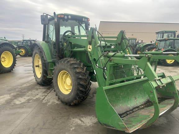 Image of John Deere 6420 equipment image 1