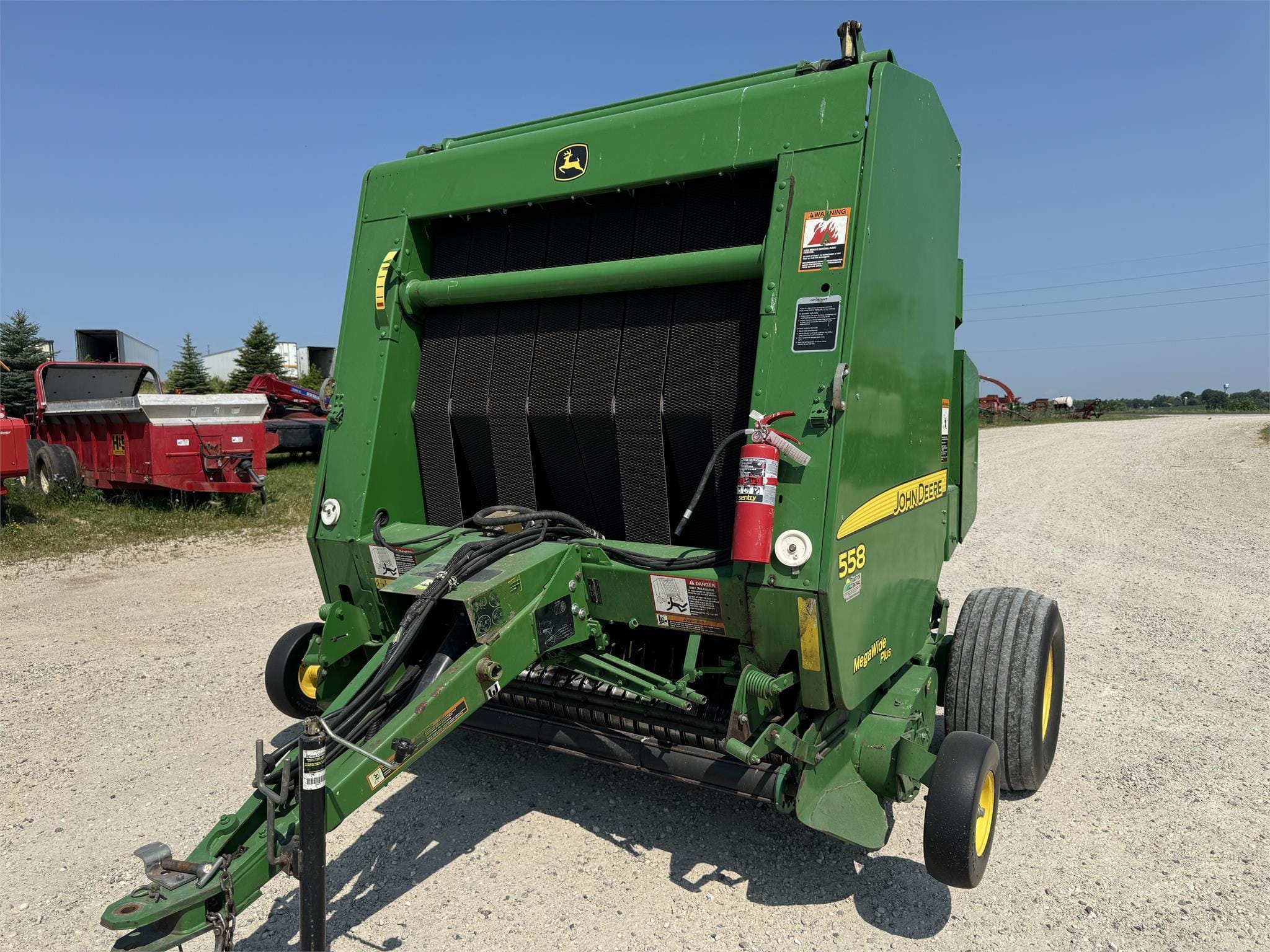 2009 John Deere 558 Equipment Image0