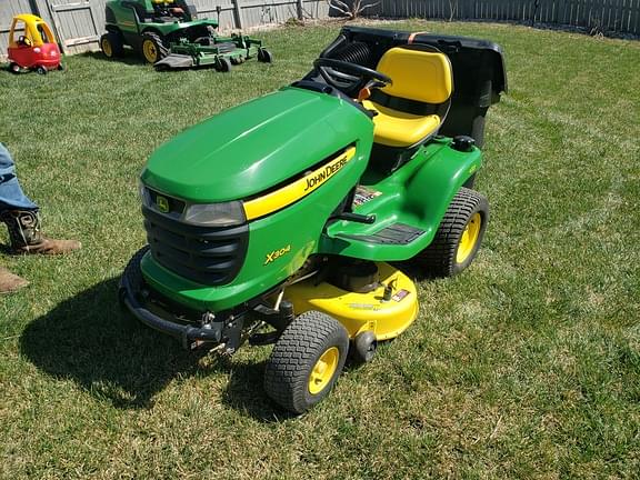 Image of John Deere X304 equipment image 2