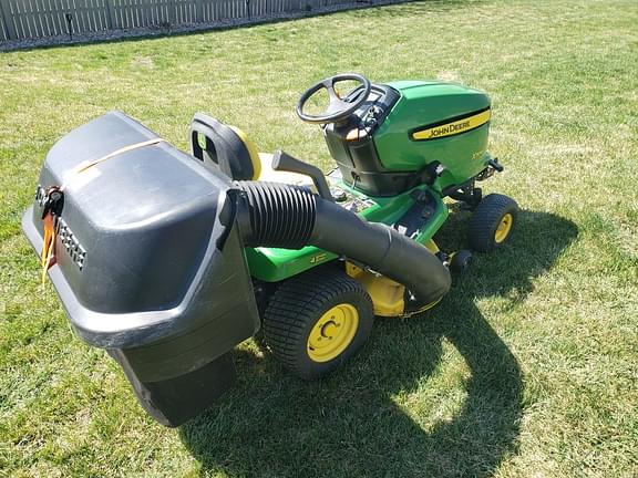 Image of John Deere X304 equipment image 4