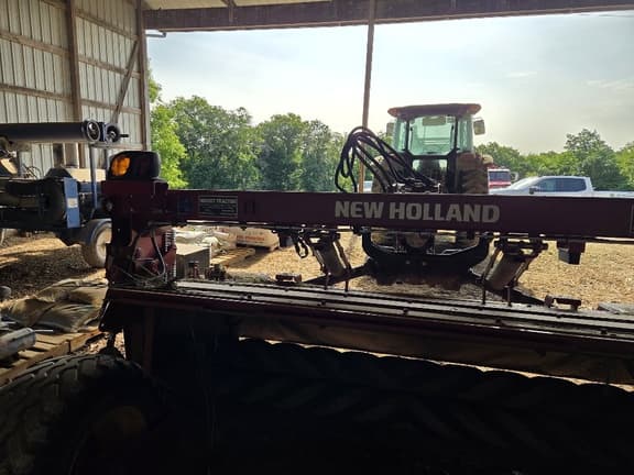Image of New Holland 310 equipment image 4
