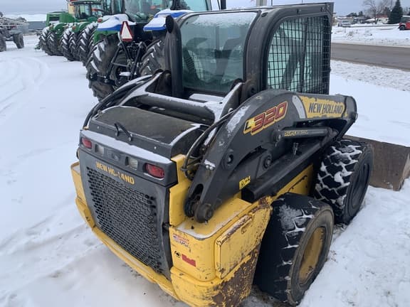 Image of New Holland L320 equipment image 4