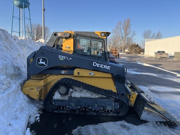 Image of John Deere 335P equipment image 4
